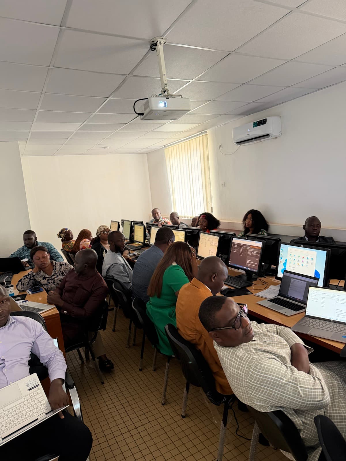 Participants gathered at the workstations.
