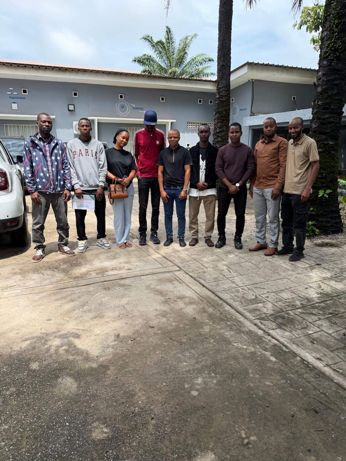 A group photograph following the July training.