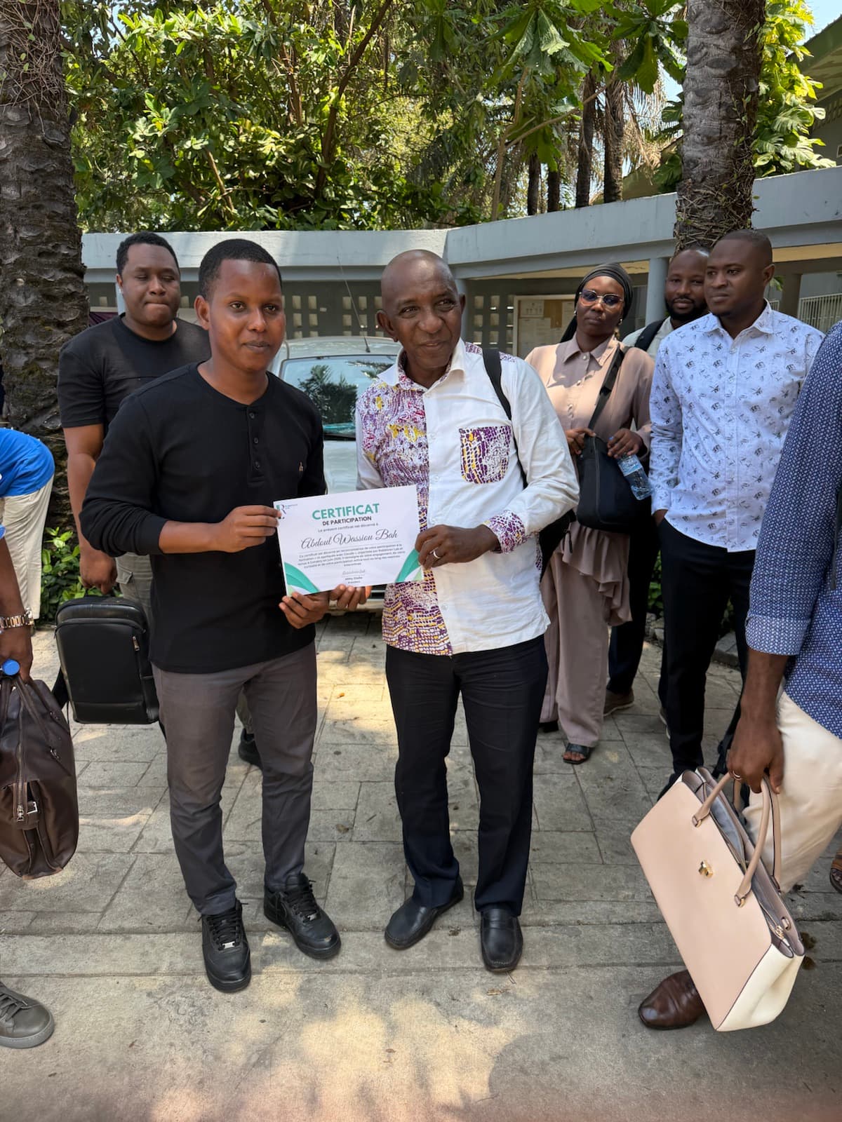 A shared moment during the June certificate presentations.